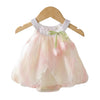 Cream and blush pink ombre baby girl romper with tulip petal layers, a white collar, sage green bow and easy poppers. A sweet baby gift. UK delivery.