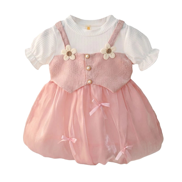 Girls pink pinafore party dress with white ribbed puff sleeve top, daisy flowers, pearl buttons and bubble skirt with bows – front view